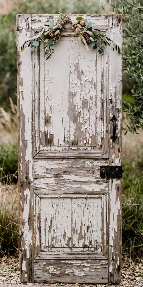 Antique weathered wooden door as a rustic photo backdrop